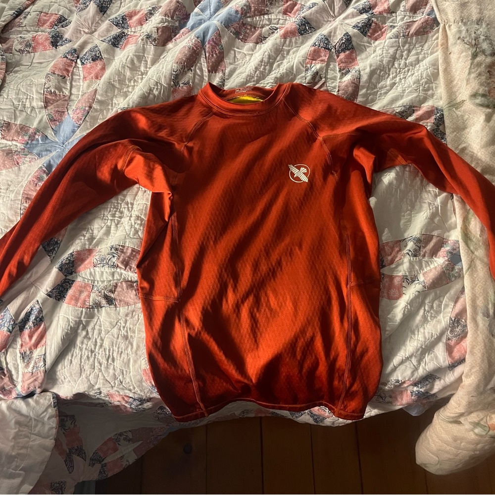Hyabusa BJJ, MMA and fight rash guard.  Used once.